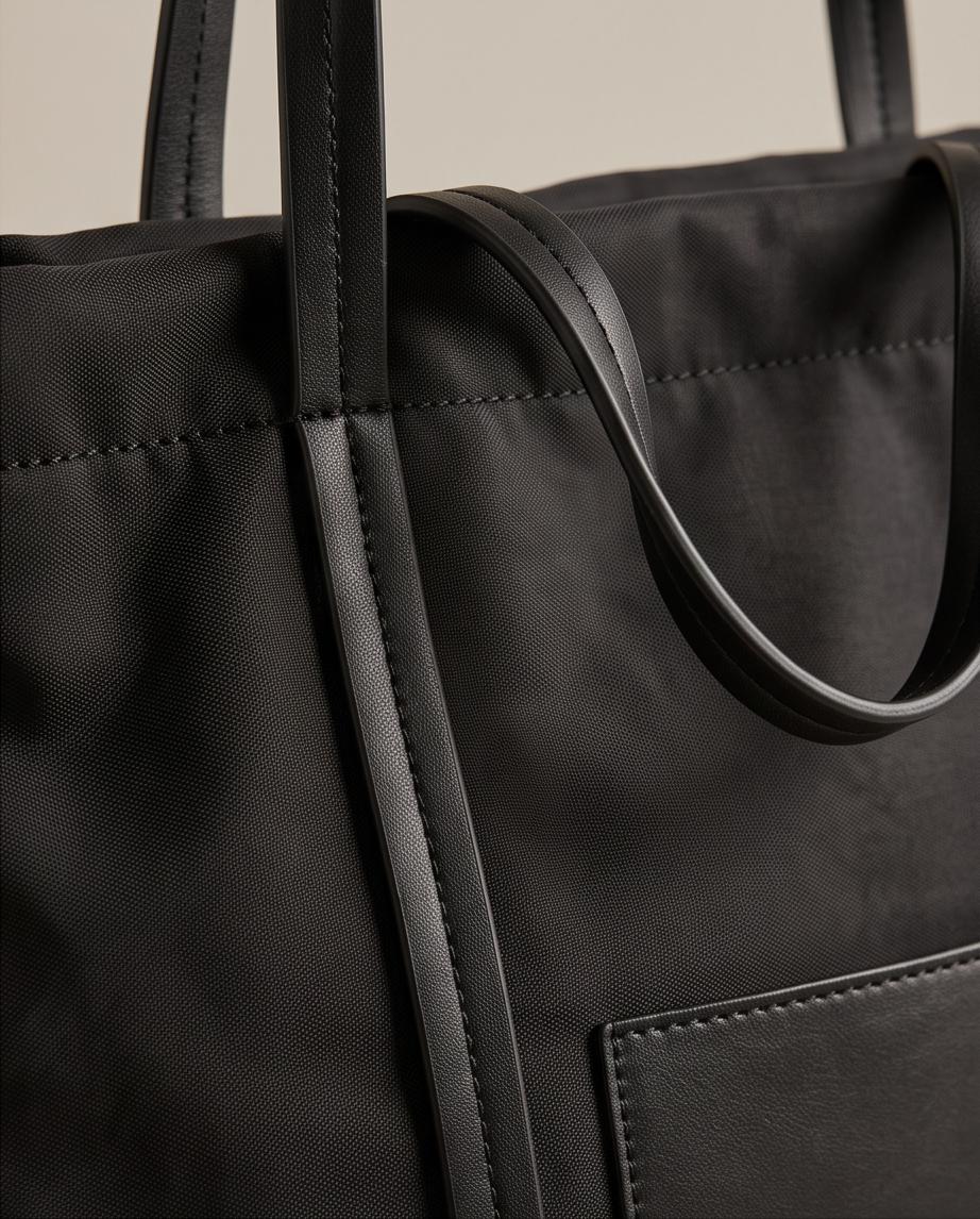 Detalle de asas y tejido del Bolso Búzios negro