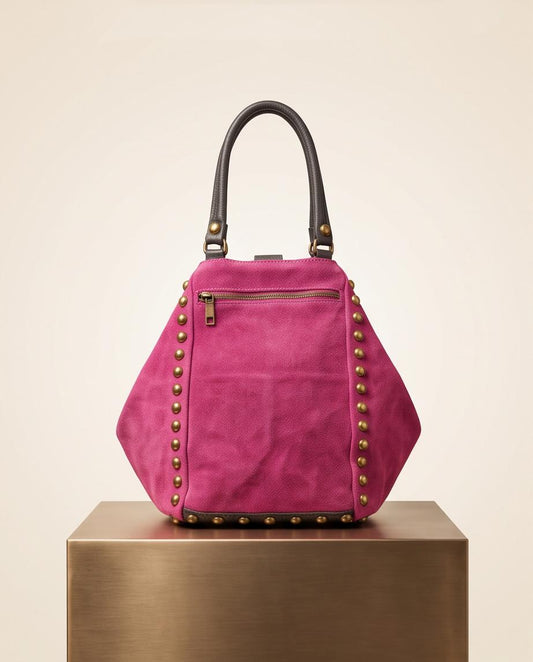 Bolso de cuero Jericoacoara fucsia con remaches Made in Italy