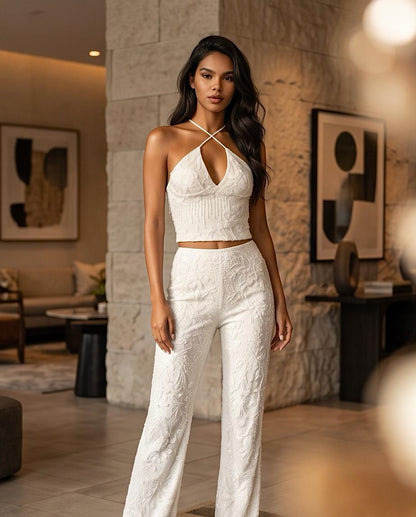 Top Bonaire blanco con escote halter y lentejuelas.