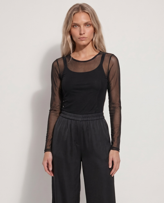 Top de manga larga en malla fina transparente de color negro para looks de fiesta - Eutea